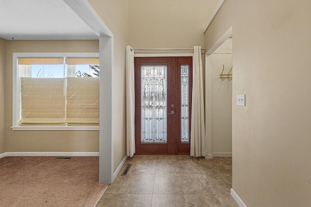 entrance foyer featuring visible vents and baseboards