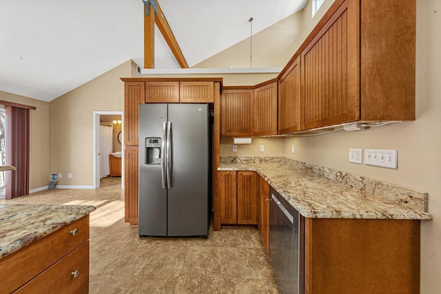 kitchen featuring lofted ceiling, light stone countertops, appliances with stainless steel finishes, and brown cabinetry