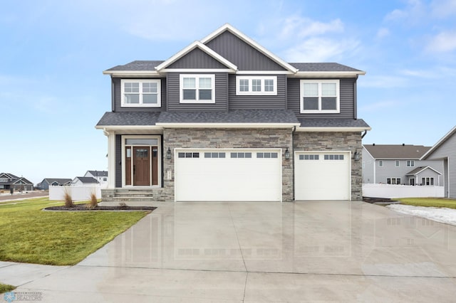 view of front of property with a shingled roof, a garage, stone siding, driveway, and a front lawn