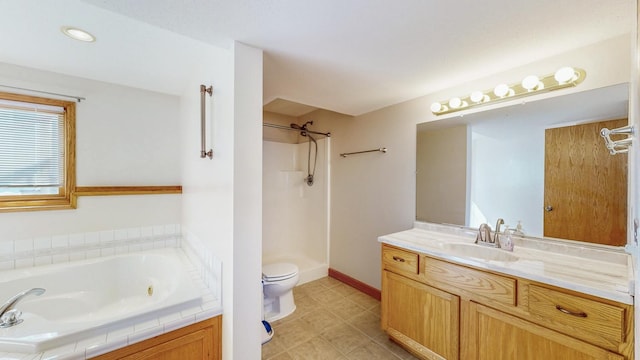 bathroom with vanity, a tub to relax in, baseboards, a shower, and toilet