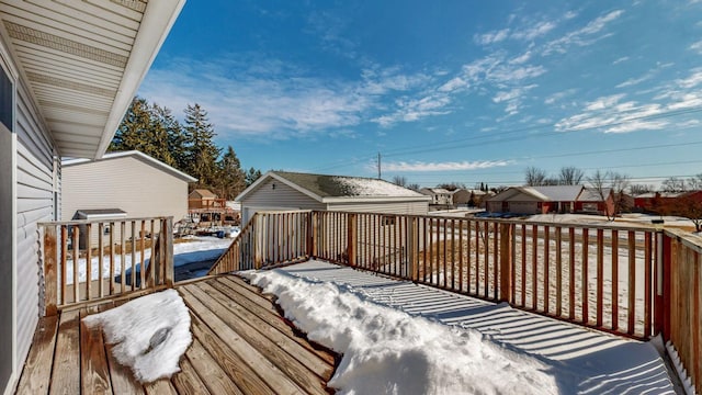 view of snow covered deck