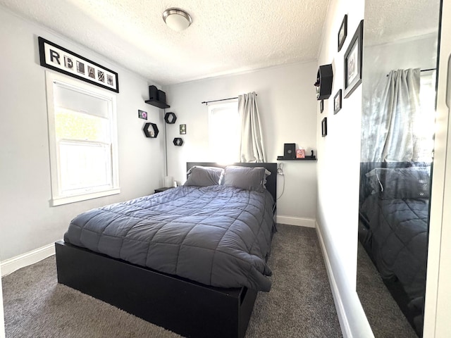 6915 11th Ave S, Richfield, MN 55423 - carpeted bedroom with a textured ceiling and baseboards