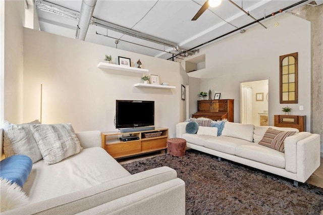 living room with ceiling fan