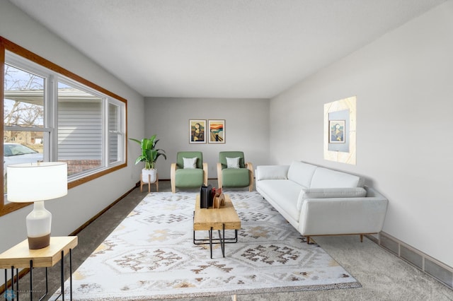 3129 7th St N, Fargo, ND 58102 - living room featuring baseboards and carpet