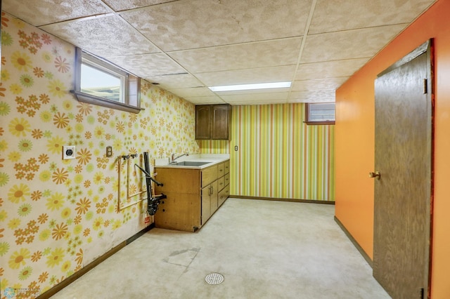 3129 7th St N, Fargo, ND 58102 - bar area featuring wallpapered walls, a sink, baseboards, light colored carpet, and a paneled ceiling