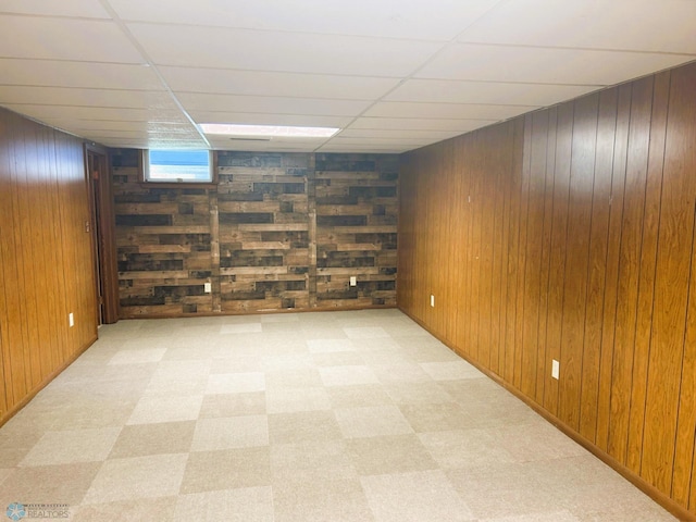 3129 7th St N, Fargo, ND 58102 - below grade area with wood walls and a drop ceiling