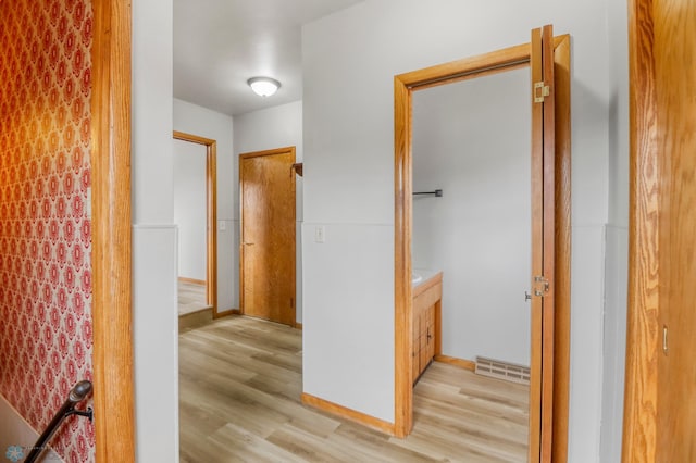 3129 7th St N, Fargo, ND 58102 - corridor with light wood-type flooring and baseboards