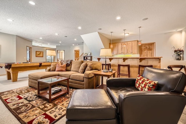 carpeted living room with recessed lighting, pool table, and a textured ceiling