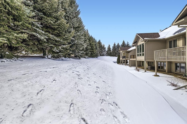 view of yard covered in snow