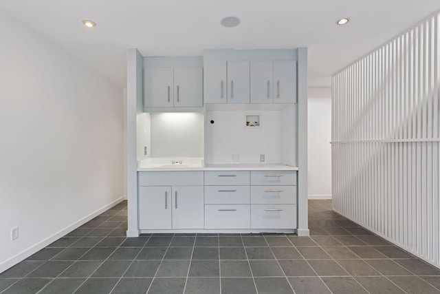 2049 Broadway St, Marine On Saint Croix, MN 55047 - kitchen with dark tile patterned floors, light countertops, white cabinetry, and recessed lighting