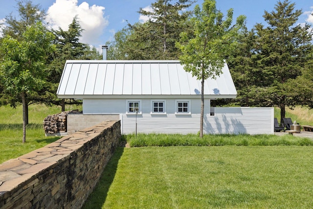 2049 Broadway St, Marine On Saint Croix, MN 55047 - view of side of home with a standing seam roof, a lawn, and a metal roof