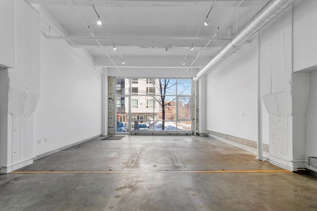 garage featuring baseboards