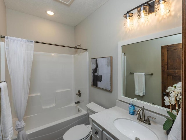 bathroom with shower / bath combo, toilet, a textured ceiling, vanity, and recessed lighting