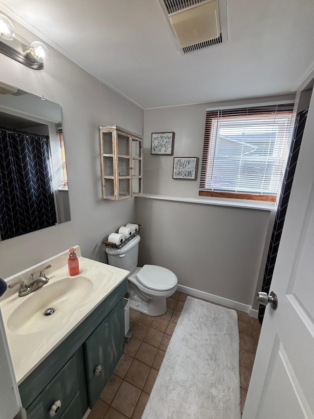 full bathroom featuring visible vents, toilet, tile patterned flooring, baseboards, and vanity