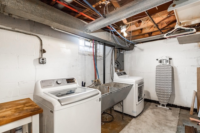 laundry room with separate washer and dryer
