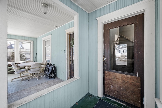 doorway to property featuring a porch