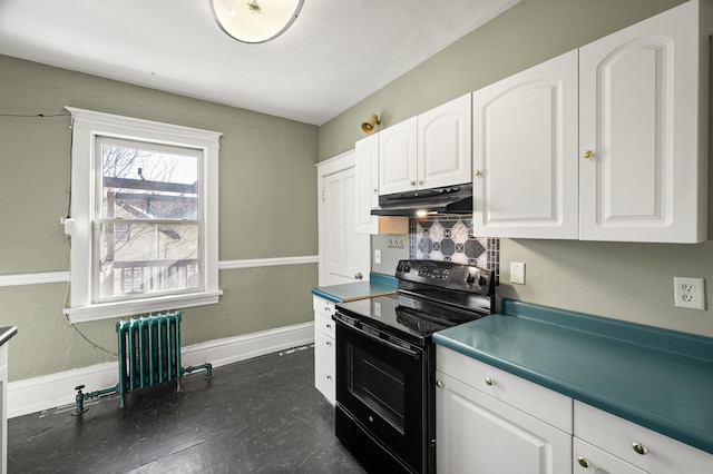 kitchen with under cabinet range hood, white cabinets, radiator, and black range with electric stovetop