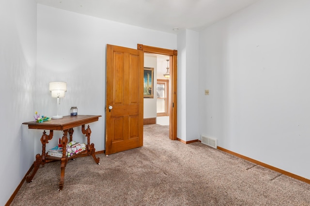 interior space with visible vents and baseboards