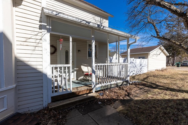 property entrance featuring covered porch