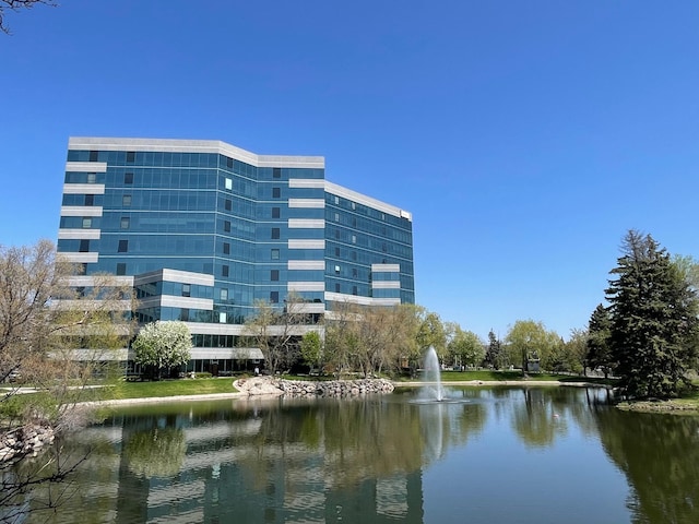 view of building exterior with a water view