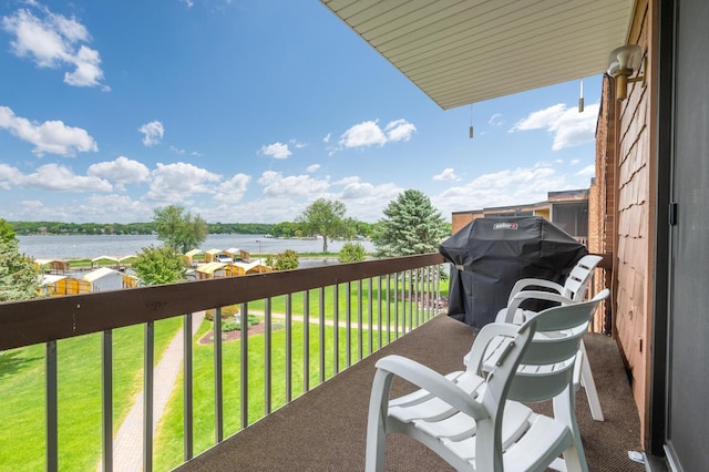 5430 Three Points Blvd Unit 131, Mound, MN 55364 - balcony featuring a water view and a grill