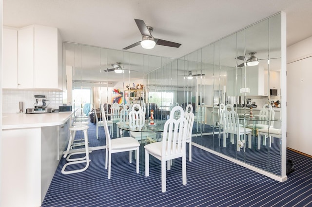 5430 Three Points Blvd Unit 131, Mound, MN 55364 - dining room featuring ceiling fan and carpet