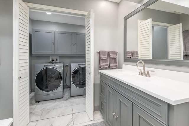 5430 Three Points Blvd Unit 131, Mound, MN 55364 - laundry room featuring washing machine and dryer and cabinet space