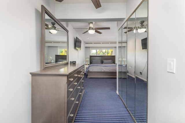 5430 Three Points Blvd Unit 131, Mound, MN 55364 - bedroom with dark carpet and ceiling fan