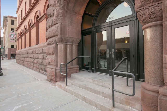 entrance to property featuring french doors