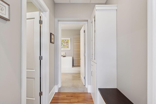 corridor featuring light wood-style flooring