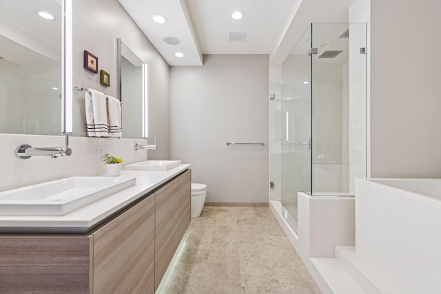 full bath featuring toilet, visible vents, a stall shower, and a sink