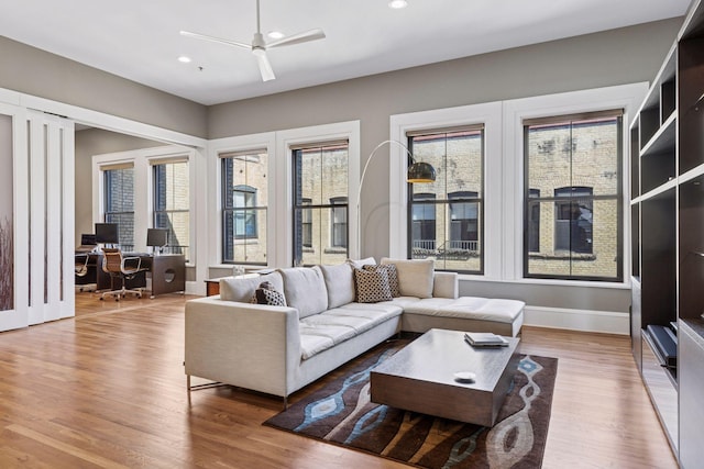 living room with recessed lighting, baseboards, wood finished floors, and ceiling fan