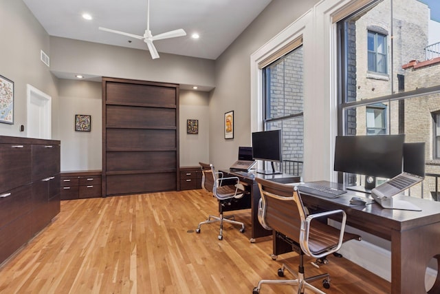 office with recessed lighting, light wood-type flooring, visible vents, and ceiling fan