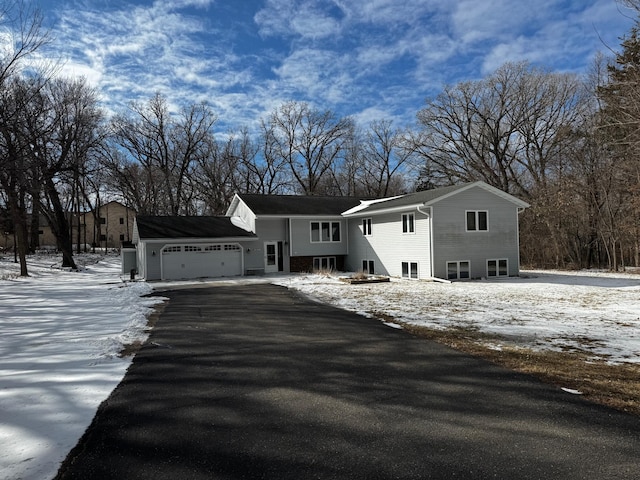 view of front of home with an attached garage and driveway