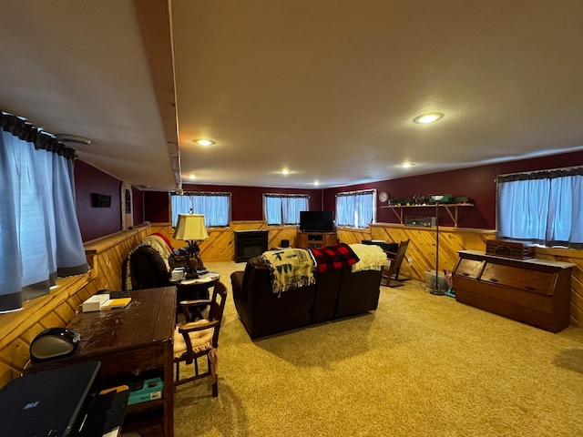 interior space featuring recessed lighting, wainscoting, and wooden walls