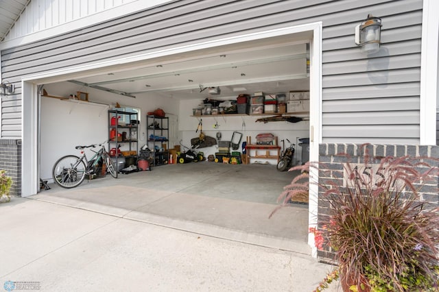 garage featuring driveway