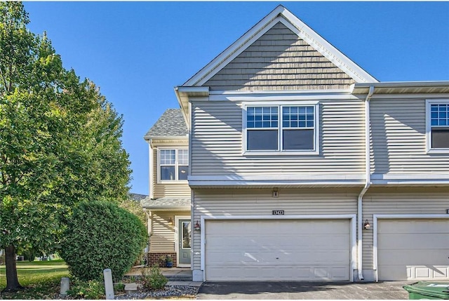 view of front of property featuring a garage and driveway