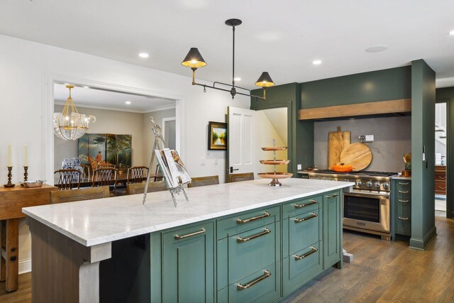 10 Saint Albans Rd E, Hopkins, MN 55305 - kitchen with green cabinetry, stainless steel range, dark wood-style floors, ornamental molding, and pendant lighting