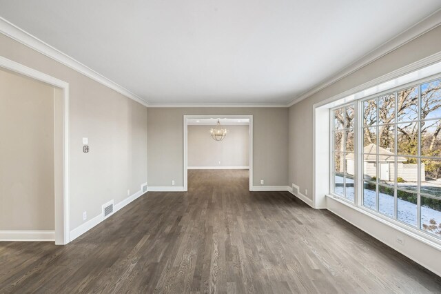 10 Saint Albans Rd E, Hopkins, MN 55305 - empty room featuring a chandelier, dark wood finished floors, baseboards, and crown molding