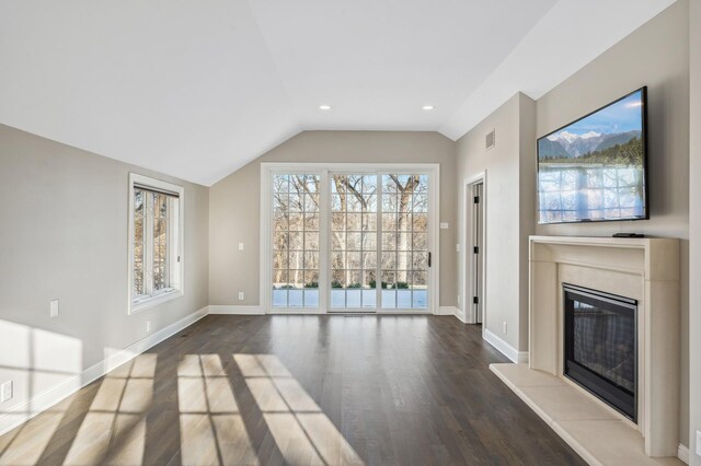 10 Saint Albans Rd E, Hopkins, MN 55305 - unfurnished living room featuring dark wood-style floors, lofted ceiling, a high end fireplace, baseboards, and recessed lighting