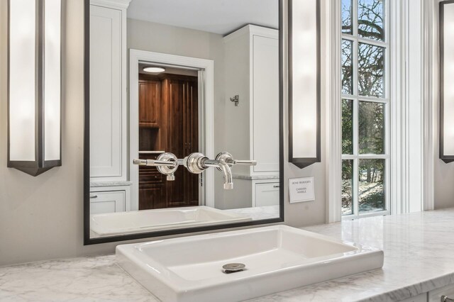 10 Saint Albans Rd E, Hopkins, MN 55305 - bathroom featuring plenty of natural light and a sink
