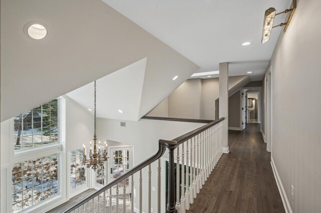 10 Saint Albans Rd E, Hopkins, MN 55305 - hallway with baseboards, wood finished floors, a chandelier, and recessed lighting