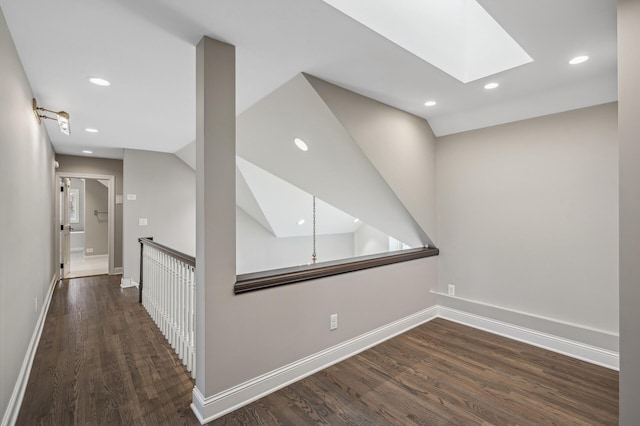 10 Saint Albans Rd E, Hopkins, MN 55305 - hallway with a skylight, wood finished floors, recessed lighting, and baseboards