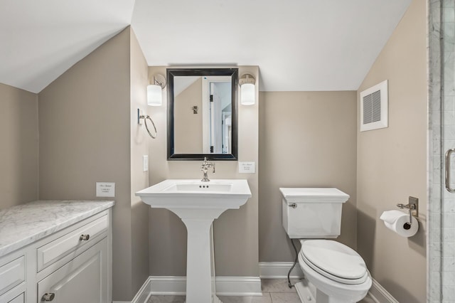 10 Saint Albans Rd E, Hopkins, MN 55305 - full bathroom with baseboards, vaulted ceiling, toilet, and a shower