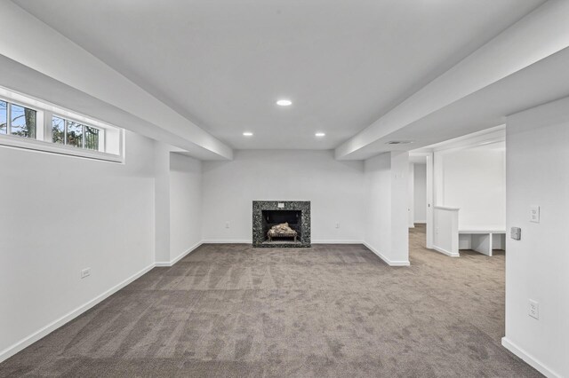 10 Saint Albans Rd E, Hopkins, MN 55305 - below grade area featuring recessed lighting, carpet, a fireplace, and baseboards
