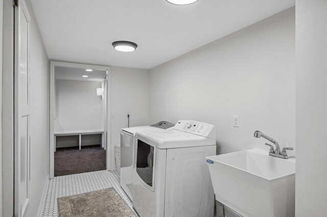 10 Saint Albans Rd E, Hopkins, MN 55305 - laundry area featuring washer and clothes dryer and light colored carpet
