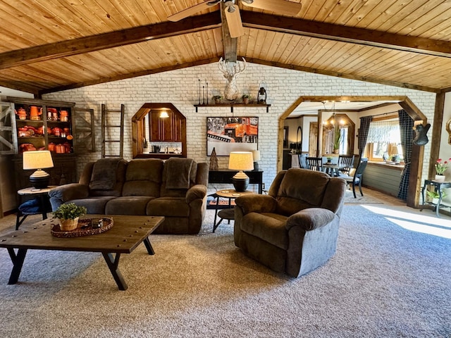 living area featuring carpet floors, arched walkways, vaulted ceiling with beams, brick wall, and wooden ceiling