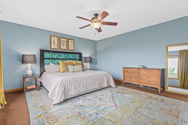 bedroom with carpet floors, a ceiling fan, and baseboards