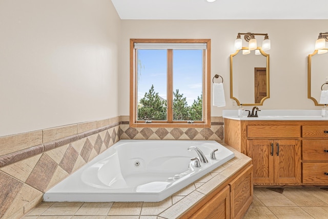 full bath with vanity and a tub with jets