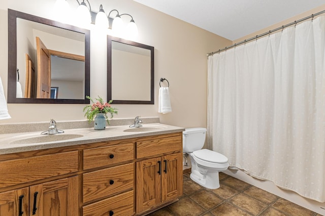 full bathroom featuring a sink, toilet, double vanity, and shower / tub combo with curtain
